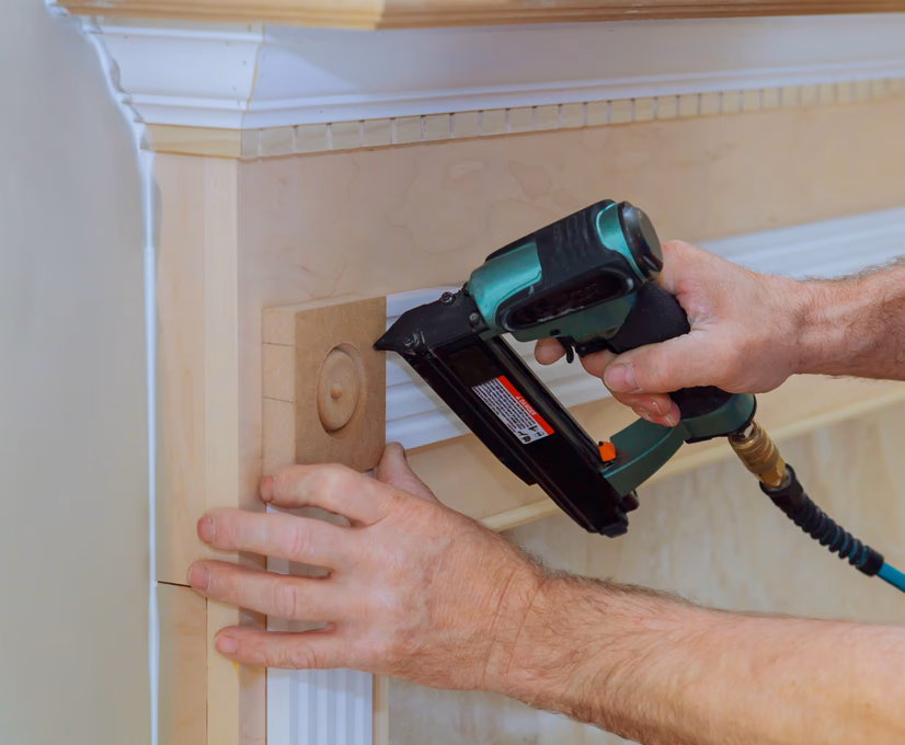 person using a drill